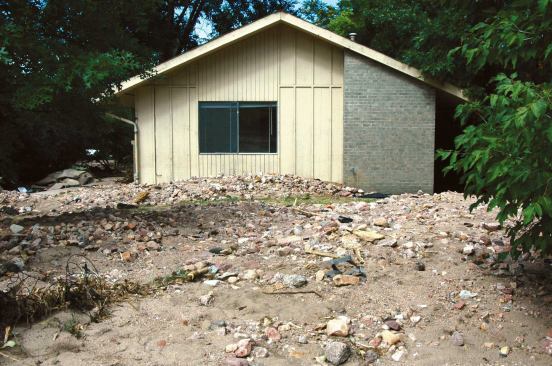 Sand and sediment near buildings was assumed to be contaminated with chemicals and sewage, and had to be hauled to landfills rather than re-used as fill.
