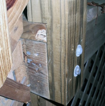 Guard posts that have been notched around the framing may develop cracks originating in the corner of the notch and running parallel to the grain. Notching weakens a post, and should be avoided.