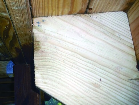Dropping the stringers without also installing a dropped header can lead to a situation like this, where the stringers have inadequate bearing on the rim joist. The risk is that the stringer will split along the grain.