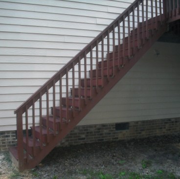 A 2x12 stringer has a maximum unsupported span of 6 feet. These stairs are likely to deflect and cause the stringers to either pull loose from the framing or shear along the grain.