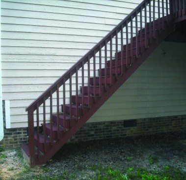 A 2x12 stringer has a maximum unsupported span of 6 feet. These stairs are likely to deflect and cause the stringers to either pull loose from the framing or shear along the grain.