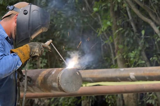 Before we drove them, we welded a steel cap on the bottom end so they would not fill up with water or mud.