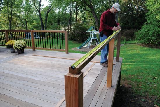 To help us visualize the kitchen's footprint, I laid out some rippings of wood on the deck. Next we made a story pole to lay out the locations of the cabinet sides and the appliances.