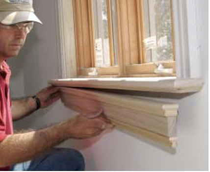 Then  he installs the apron in one  piece.
