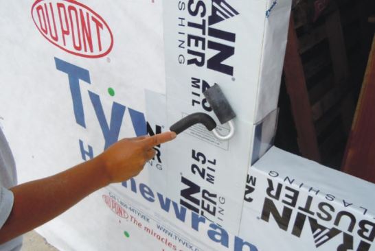 Step 3 (cont.): Each end of the sill flashing should extend at least 9 inches (the width of the flashing material) beyond the opening so the side flashing can fully lap over it. If a second layer of the envelope, such as stucco, or brick or stone veneer, will be applied, install a bib or apron under the window pan flashing so this second layer can be tucked under it. This will ensure that water drains to the exterior.
