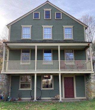 The tavern during the initial restoration (left), and as it was before the final restoration (above). The summer kitchen is on the lower floor.