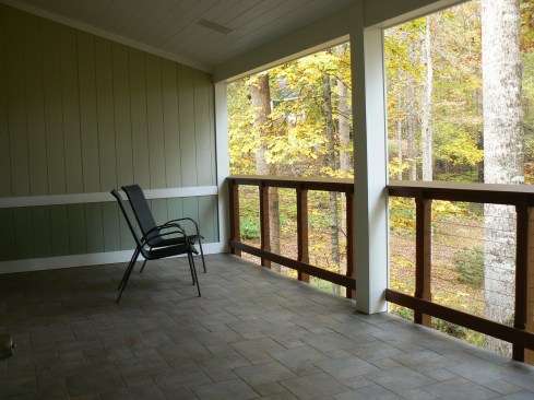 Even after four years of use, the porch floor looks as good as the day the tile was installed.