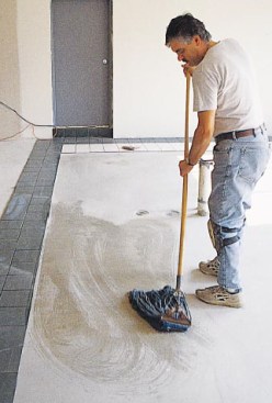 Dirty substrates create poor bonding conditions. Concrete substrates should be wet mopped and plywood substrates damp mopped, with the mop water changed regularly.
