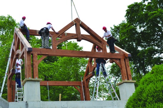 After OakBridge workers installed the dormer face truss and remaining 8x8 rafters to finish up the frame, a local crew installed a white-pine tongue-and-groove roof deck.