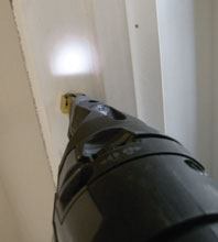 When the trigger is squeezed or the contact element depressed, a light comes on in the nose. It provides just enough illumination to help in low-light conditions.