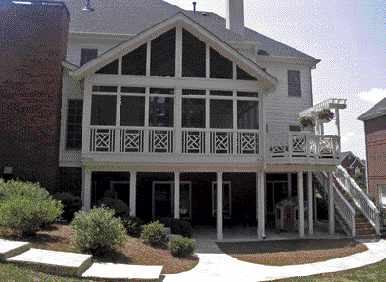 Figure 1. Elevated decks require more thought than ground-level decks. Difficulties of working at a height, safety concerns, increased footing loads, unfamiliar materials such as steel, and a greater need for lateral bracing all contribute to — and justify — significantly higher pricing.