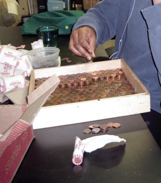 First, collect 1 million pennies. The Philadelphia Mint makes 8 million of them every shift, so you’d think it would be simple to buy a certain amount of brand-new matching coins. But that’s not how it works. You have to get them in mixed $25 boxes from local banks, a few here and a few there. Then someone has to spend a lot of time tearing open the rolls.