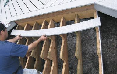 Figure 4. When an arcing stair springs from a straight deck, the upper tread is deeper in the center than at the edges.