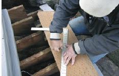 Figure 9. Mark the riser cuts using a square that's aligned with the tread cut below and the mark representing the front of the tread run above.