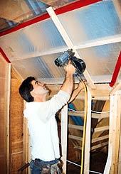 ... install a reinforced vapor barrier and strapping ...