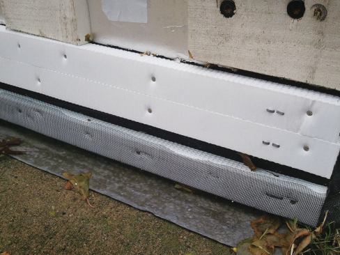 Vent strips were installed at the top and bottom of each wall for drainage and to allow air to flow freely behind the clapboards.