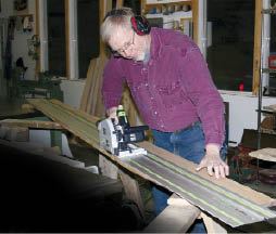 Figure 2. The author uses Festool's guide rails to quickly create an initial straight edge on rough lumber.
