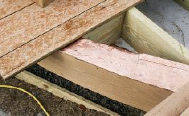 Figure 4. Copper flashing keeps water from collecting in rot-prone areas, such as between double joists.