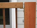 Figure 9. Bronze angle supports the railing and provides an air gap to foster drying at a vulnerable joint.