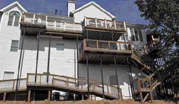 Figure 9. For decks elevated 13 or more feet, steel columns are needed to provide rigidity. Have the footings in place to determine column height before ordering.