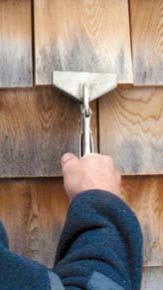 Figure 8. Wide-jawed locking pliers exert enough clamping pressure to allow a shingle to be wiggled free of its nails.
