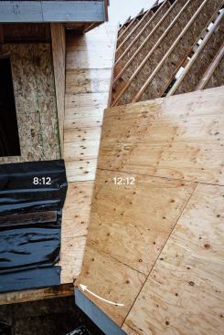 The valley doesn’t line up perfectly with the intersection of the fascia, but the offset is very minor. Unless you knew the offset was there (see arrow), you wouldn’t notice it.