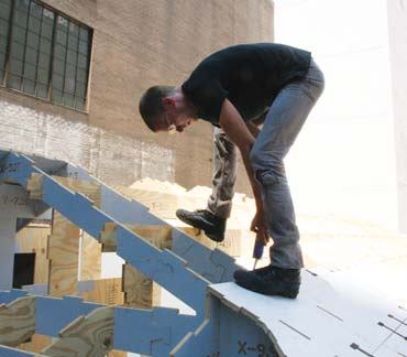 Made of 5,200 interlocking, friction-fitting plywood components, the 400-square-foot house was assembled mainly with clamps and rubber mallets.