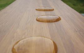 Figure 3. Protecting wood from the effects of moisture is the ultimate goal of a finish. A clear sealer will slow down or in some cases prevent water migration into the grain. A clear sealer shown here on bamboo, which is incredibly dense, illustrates how some products can perform. Photo by Cutek.