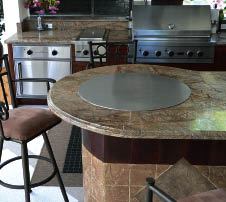 Figure 6. Outdoor kitchens can add a considerable dead load to the deck. To the weight of the cabinets themselves, you need to add the weight of such items as appliances and granite countertops.