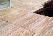 Figure 7a. Left unstained, this ipe deck grayed as a natural result of UV exposure. Known as photochemical degradation, it's unavoidable unless you use a color-enhanced finish, like toner or stain. Photo by TWP.