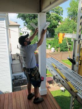 The top collar is the only component that can be installed in one piece. I swing the free side out of the way as it slips around the sleeve. Now it's just a matter of swinging that side back into place to complete the assembly.