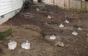 Figure 1. The footings were located to provide a maximum two-foot joist overhang.