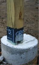 Figure 6. To isolate the framing hardware from corrosion-inducing wood preservatives, the author first wraps the wood with peel-and stick-membrane. Finish materials will cover the membrane, both for looks and to protect it from degrading in the sunlight.