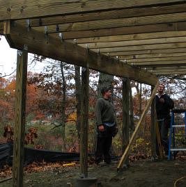 Figure 8. Because of the potential for uplift from high winds and floods in coastal areas, joists, beams, and posts must all be connected to the footings through a chain of hold-downs.
