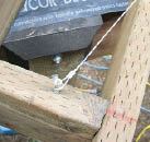 Screws anchor the ends of the cable at the ellipse's foci.