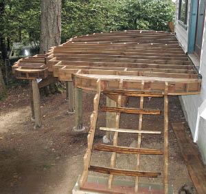 Figure 6. With the stairs framed and the ends of the joists blocked, the framing is ready for the fascia and decking.