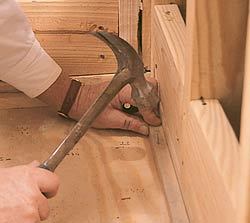3/4-inch float strips are nailed around the perimeter of the shower floor.