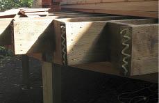 Figure 7. Construction adhesive will hold the first of the four thin layers of fascia to the ends of the joists.