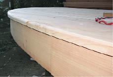 Figure 16. After being cut, the ends of the decking were belt-sanded smooth and the edges eased with a router.