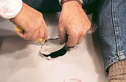 Then slice the membrane around the inside diameter of the drain.