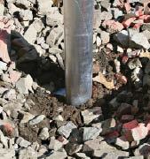 Figure 4. As the driver turns the pile, it simply screws into the ground until the installer is confident it's below the frostline and in soil with sufficient bearing capacity.