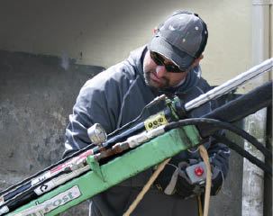 Figure 5. The helical pile's bearing capacity usually relates to the torque required to drive it. A gauge on the machine measures the hydraulic pressure, which correlates to the torque.