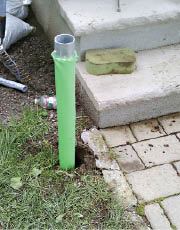 Figure 12. Because helical piles don't disturb the ground much, they can be installed alongside existing landscape features. Photo credit: Greg DiBernardo