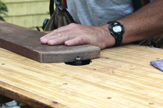 I eased the edges of the curved ends with a 3/16-inch roundover bit.