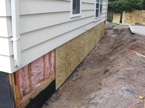 After preparing the pony wall from the exterior, we installed PT sheathing.