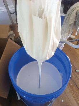 Whether brushing, spraying, or rolling, the author strains all waterbornes — even freshly opened gallons — before using them.