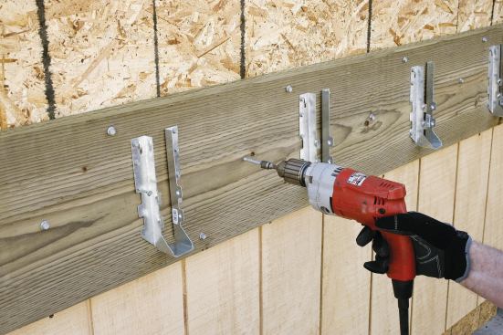 Far faster to install than lag screws or through-bolts, structural screws can be a great alternative for attaching ledgers.