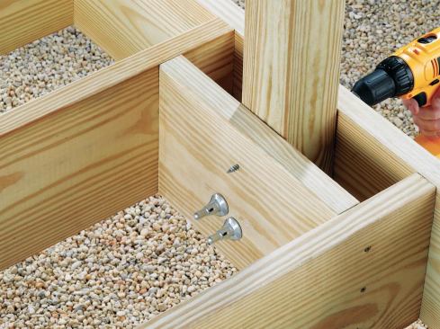 ThruLok bolts drive through the wood members with no pre-drilling. A special nut hand-threads on, and then the assembly is tightened with a few more turns of the screw.