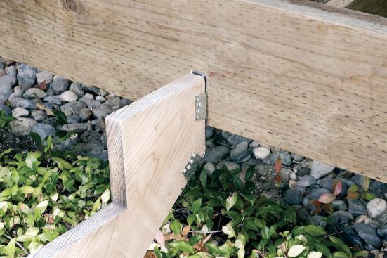 Hangers for stairs affix to the deck framing first and then to the stringer.