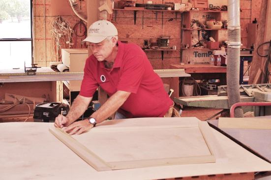 The author used a full-scale drawing as a pattern to lay out and cut the 3/4-inch by 2-inch clear poplar that would form the frames for the three facets of the top section.